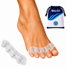 A clear toe space divider shown worn on a human foot, with a matching transparent divider piece and a branded drawstring pouch on a white background.