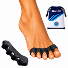 A black toe space divider shown worn on a human foot, with a separate view of the divider and a branded navy-and-white drawstring pouch on a white background.